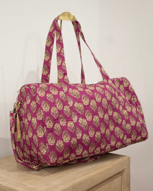 Bolsa de viaje morada flores amarillas