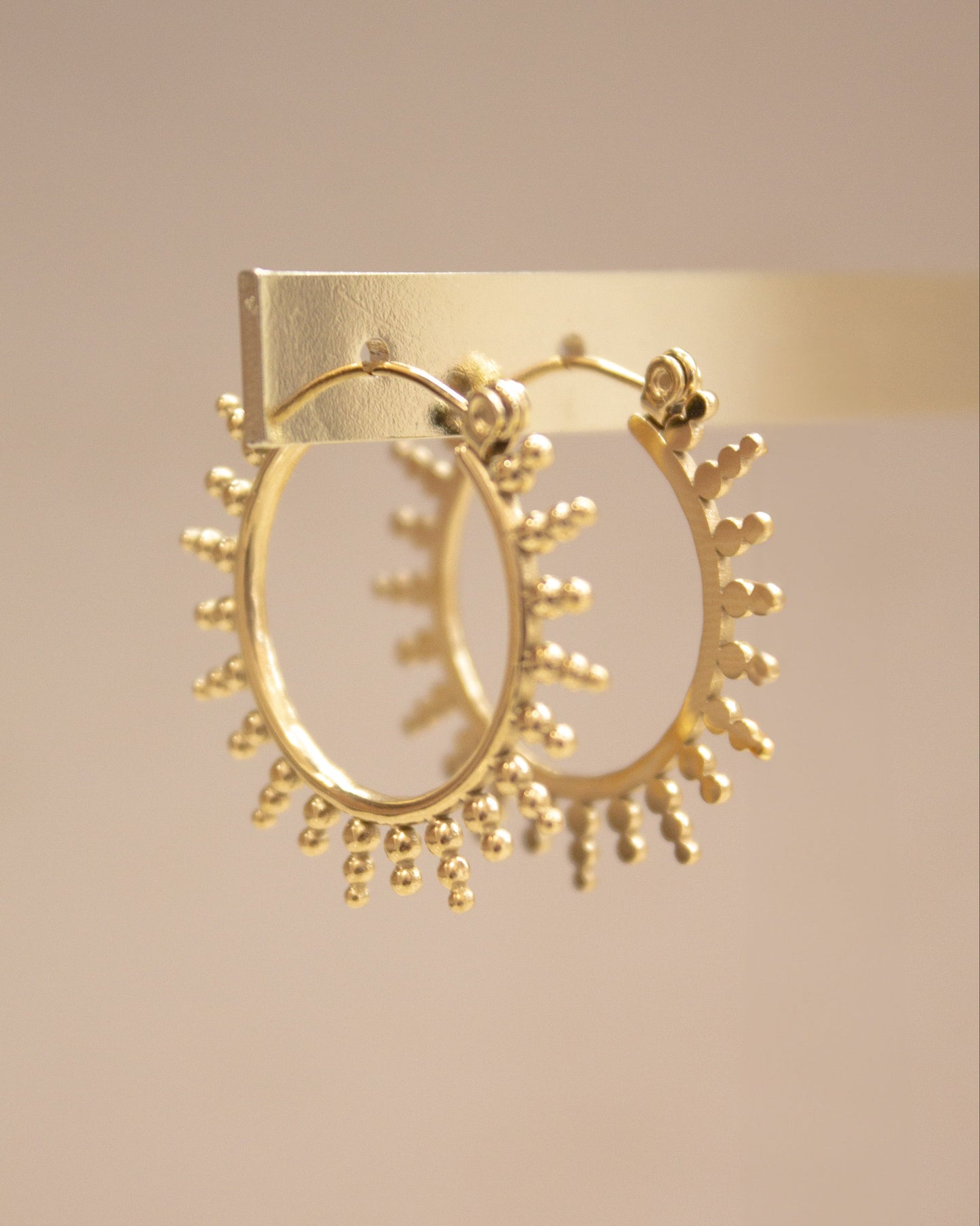 Pendientes de aro sol