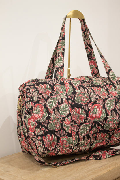 Bolsa de viaje negra flores