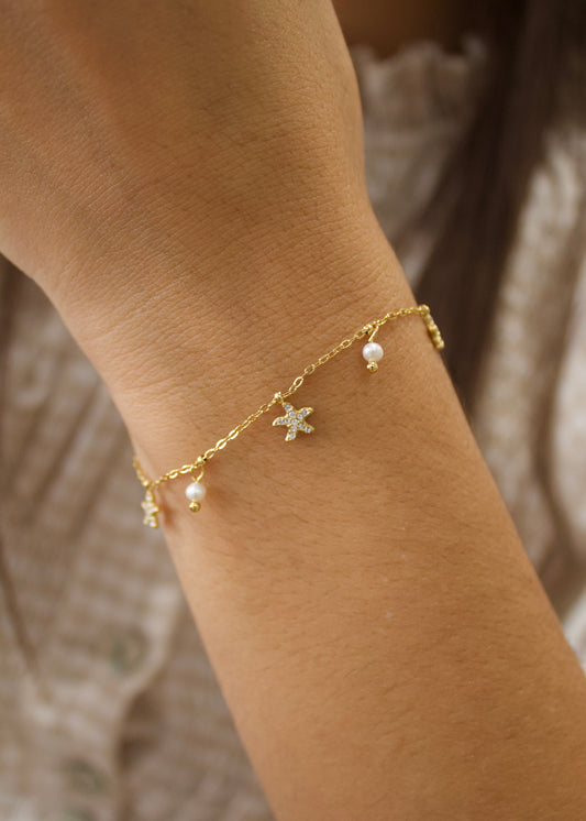 Pulsera estrellas y perlas