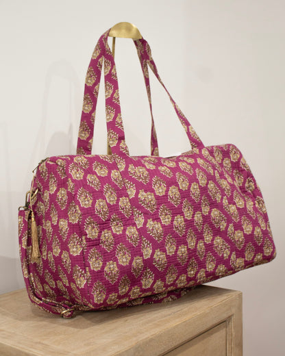 Bolsa de viaje morada flores amarillas