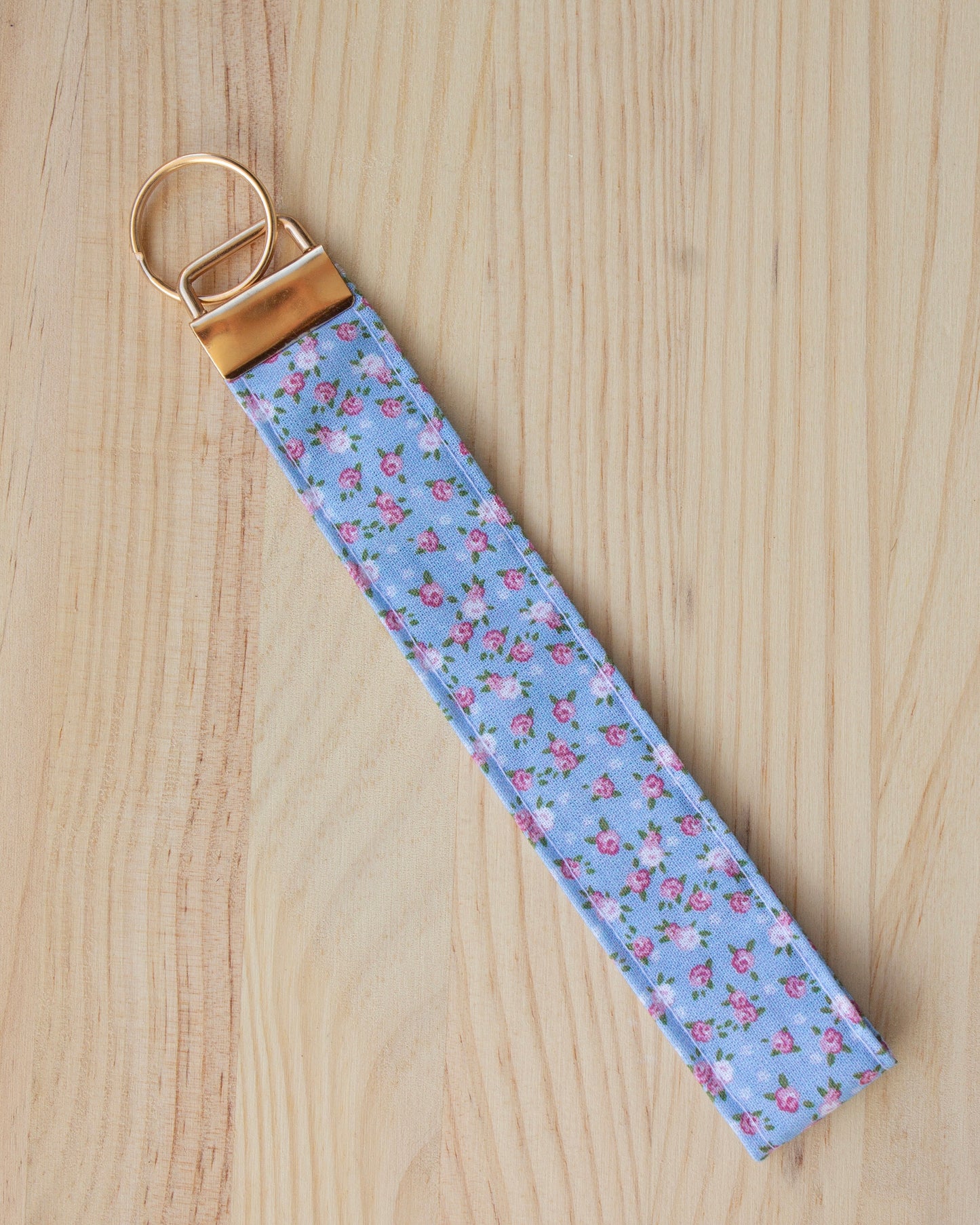 Llavero mini flores azul cielo