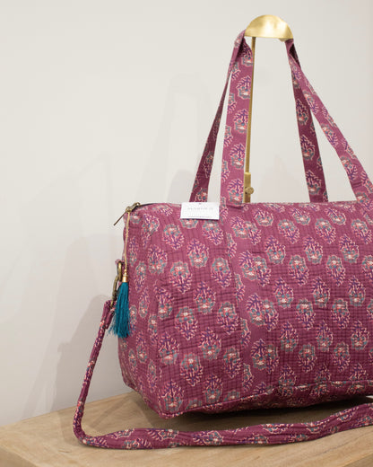 Bolsa de viaje morada flor gris