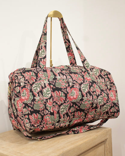Bolsa de viaje negra flores