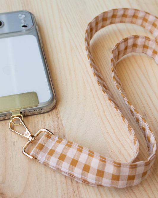 Cuelga móvil cuadros vichy mostaza