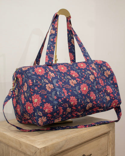 Bolsa de viaje azul marino flores rosas